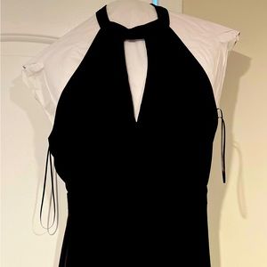 Cute little black dress.  Halter neck.